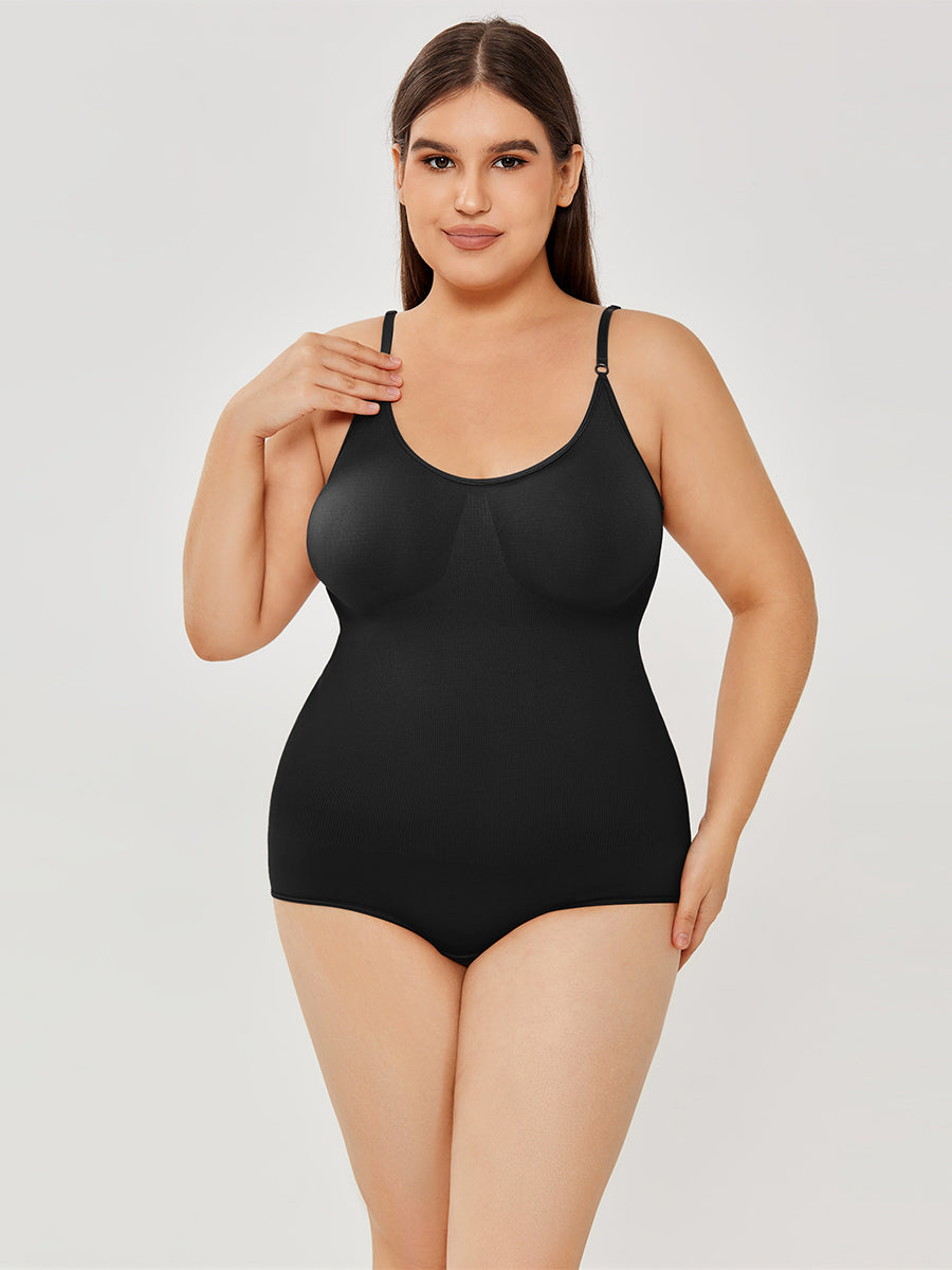 Black shaping bodysuit, front view adjusting the strap