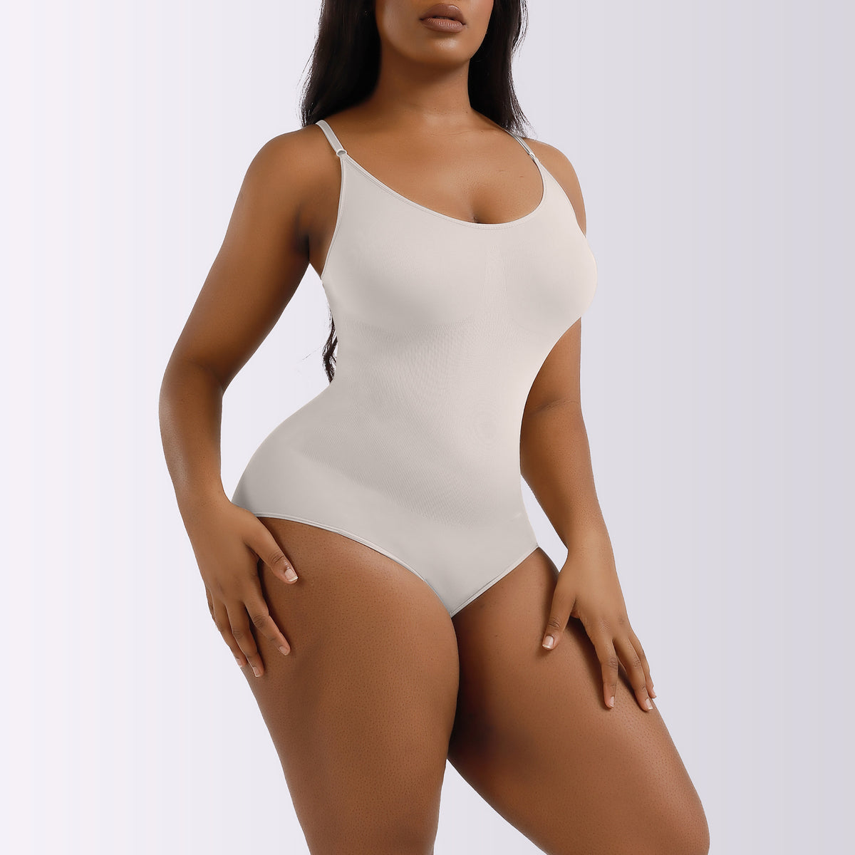 Grey seamless brief-cut bodysuit, side view on model